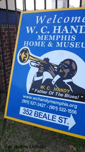 WC Hand sign at museum signed